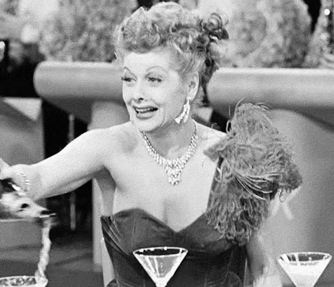 Animated gif of Lucy tipsy on champagne as a joke about her excitement over project management software