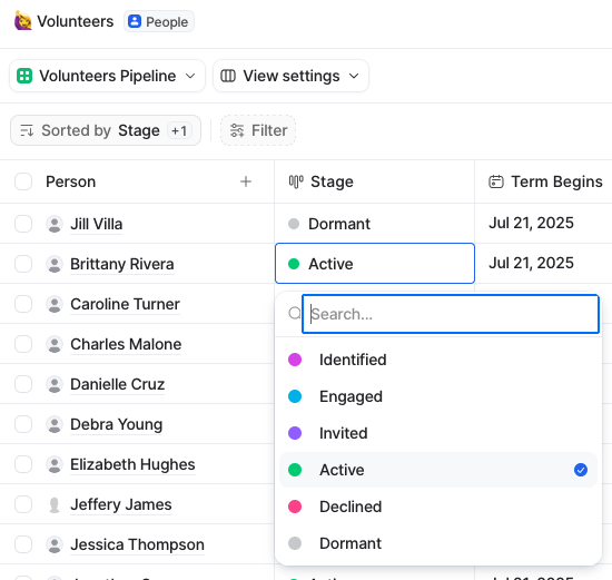 Attio Volunteers pipeline showing a person record with a dropdown of stage options: Identified, Engaged, Invited, Active, Declined, Dormant